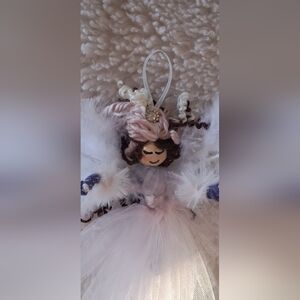 *(Handcrafted Angel Ornament Doll with Feathers.)*